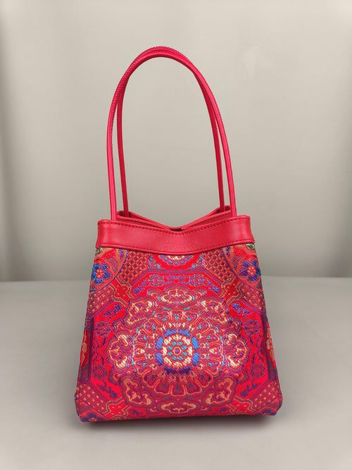sinodreams empress inferno arc classic brokat-tasche mit blau gold violett mandala-details und rotem lederkörper